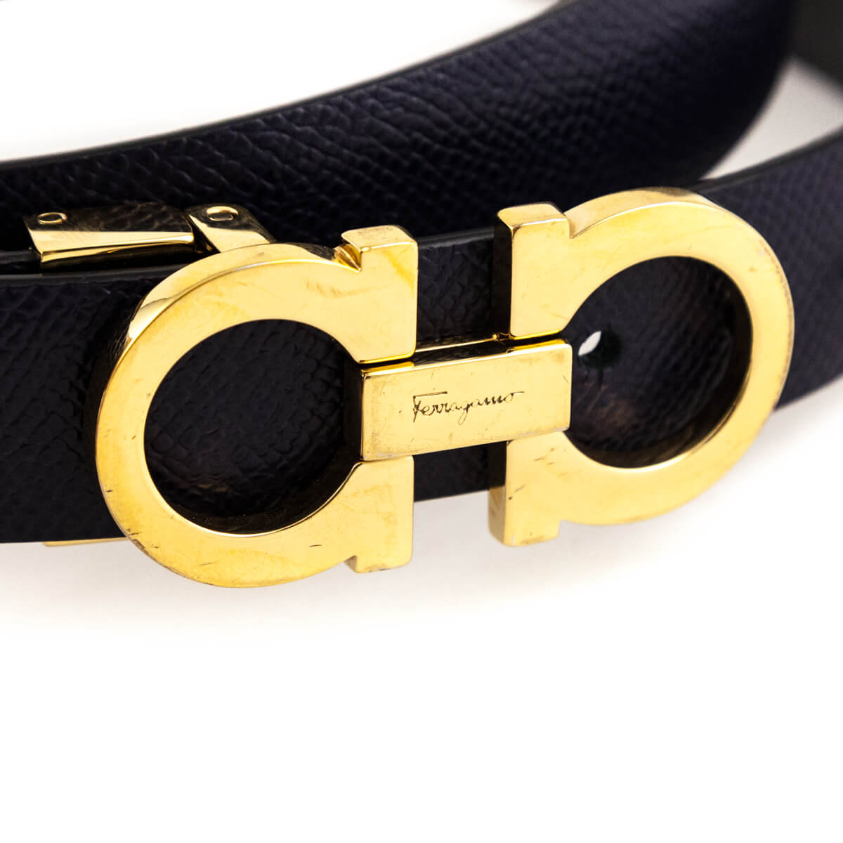 Ferragamo Navy Black Pebbled Calfskin Reversible Gancini Belt Size L - Love that Bag etc - Preowned Authentic Designer Handbags Preloved Fashions