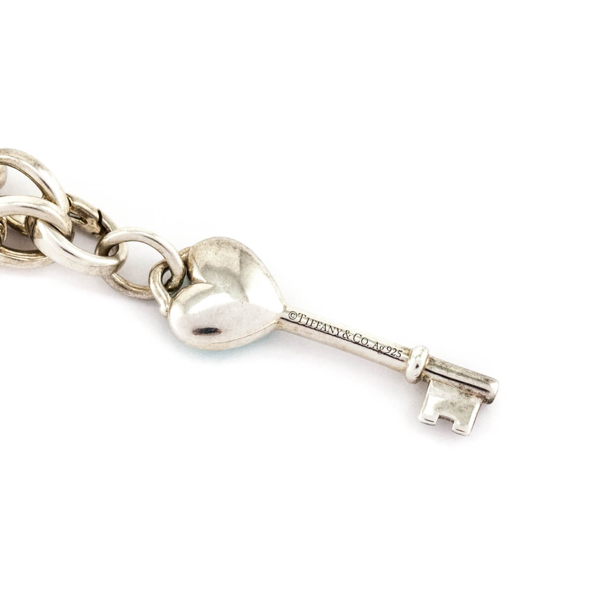 Tiffany Co. Sterling Silver Chain Blue Enamel Heart Key Bracelet Size M - Love that Bag etc - Preowned Authentic Designer Handbags Preloved Fashions
